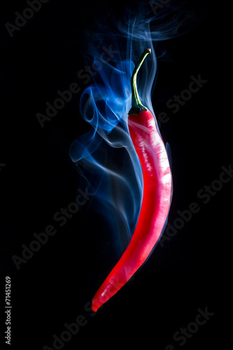 Smoking Hot Red Chilli Pepper isolated on a black background