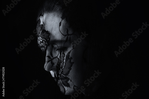 Middle Eastern woman portrait looking sad with black hijab artis © Alta Oosthuizen
