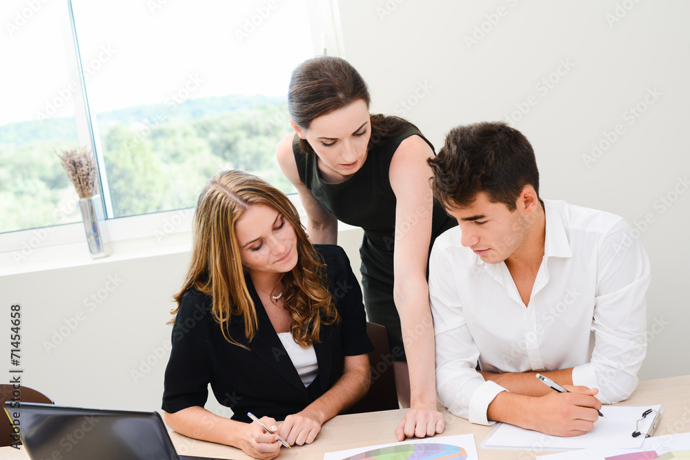 young people business team working together in a meeting room young people business team working together in a meeting room