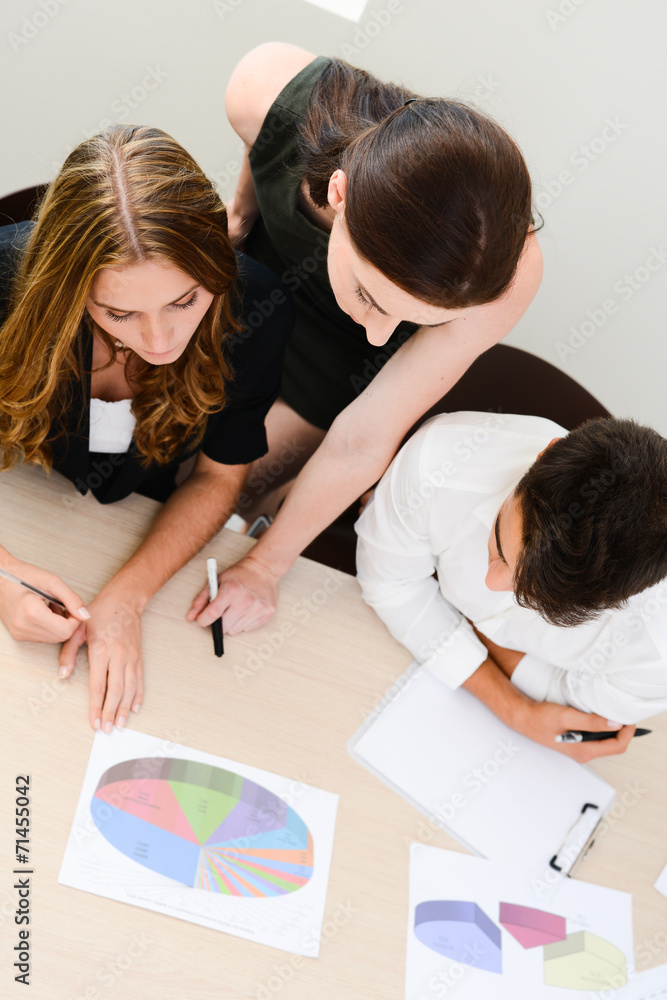 young people business team working together in a meeting room young people business team working together in a meeting room