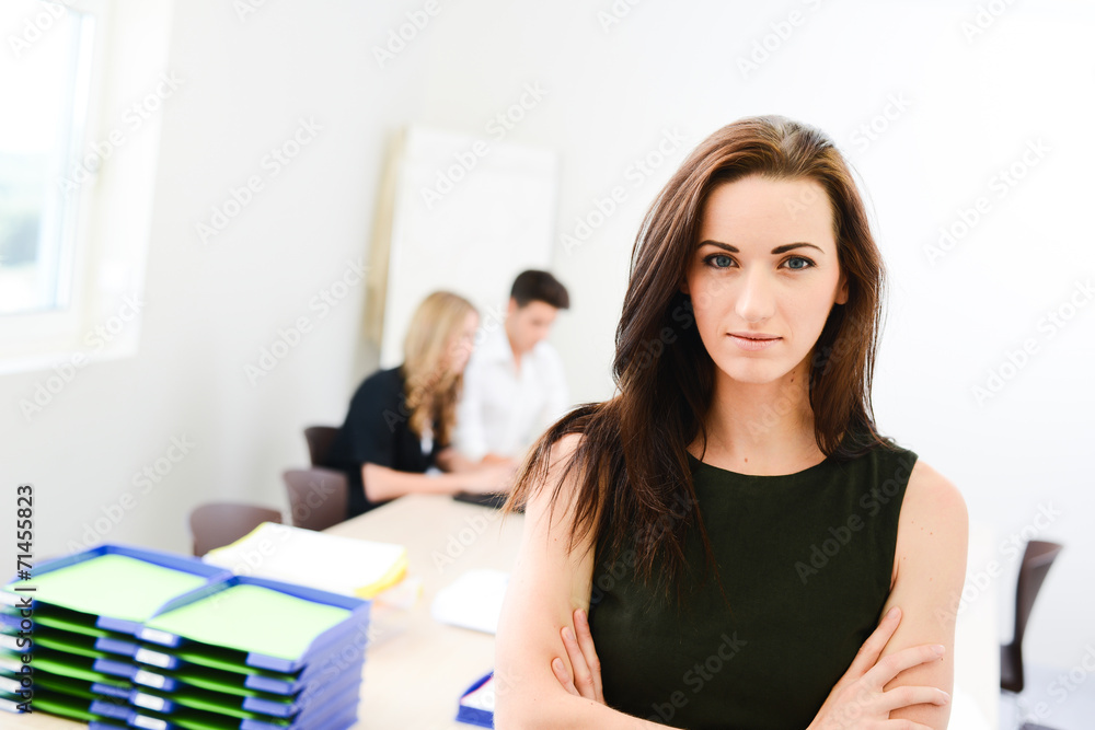 young woman executive manager in meeting room with staff young woman executive manager in meeting room with staff