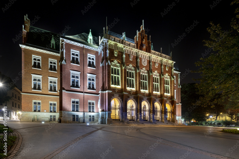 Old university building - Collegium Novum in Krakow at night