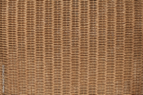 Brown wicker furniture surface. Background photo texture