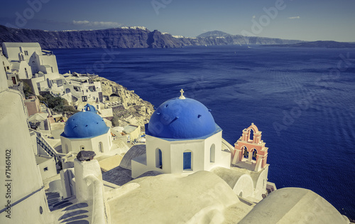 Santorini scene with famous blue dome churches, Greece