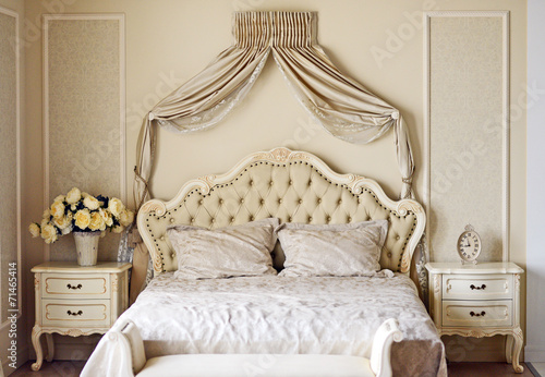 Fotografie Luxury bed in romantic style bedroom