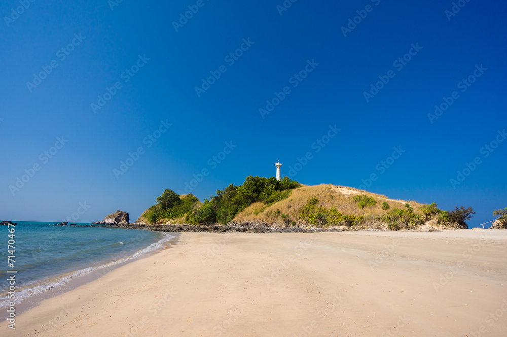 Old lighthouse and white sand beach on Koh Lanta Yai island cape