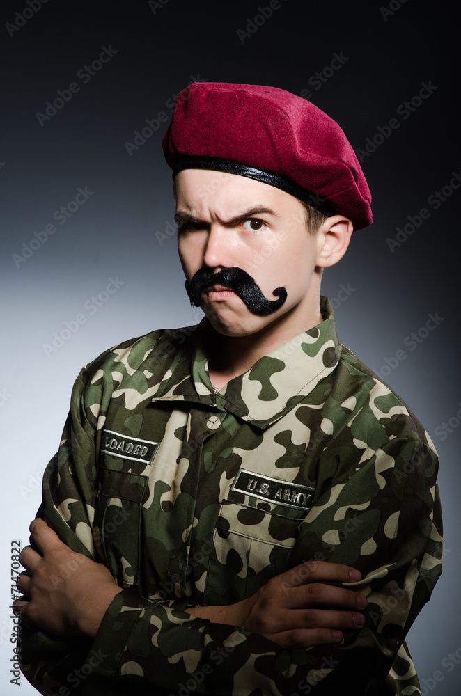 Funny soldier in military concept Funny soldier in military concept