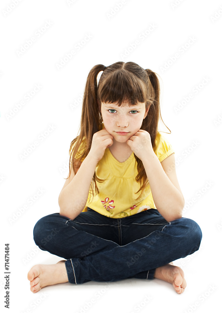 Sulky angry young girl child, sulking and pouting Sulky angry young girl child, sulking and pouting