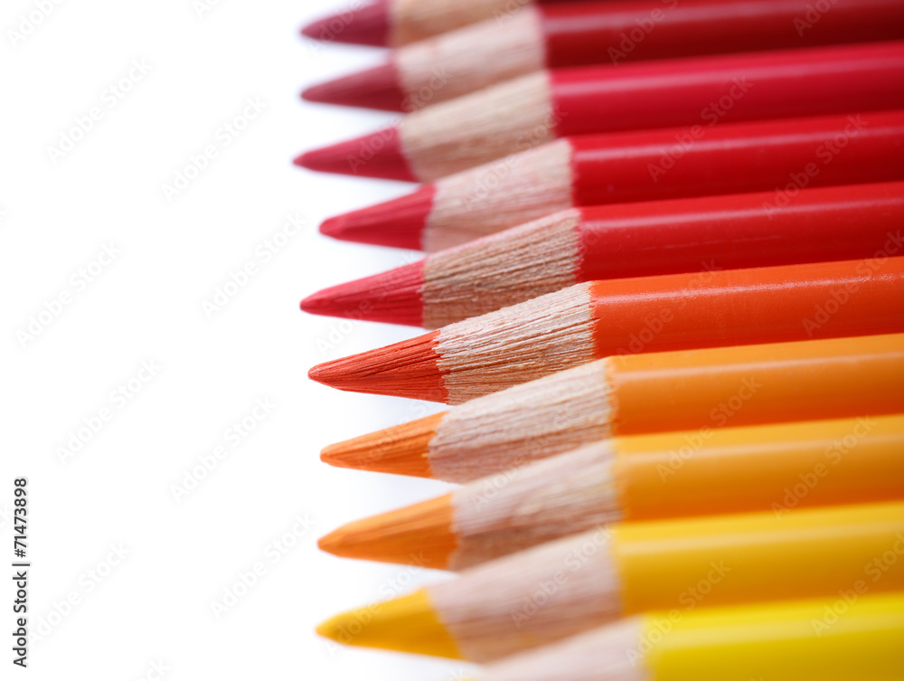 Color pencils in a row, isolated on white, shallow dof Color pencils in a row, isolated on white, shallow dof