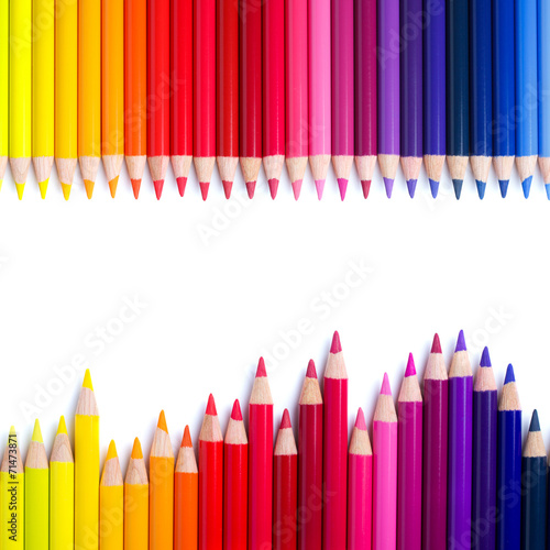 Color pencils in a row, isolated on white with copy space