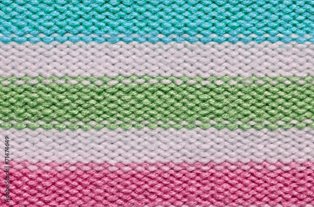 Knit woolen texture. Fabric striped background Knit woolen texture. Fabric striped background