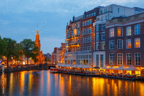 Night city view of Amsterdam canal,  and bridge photo