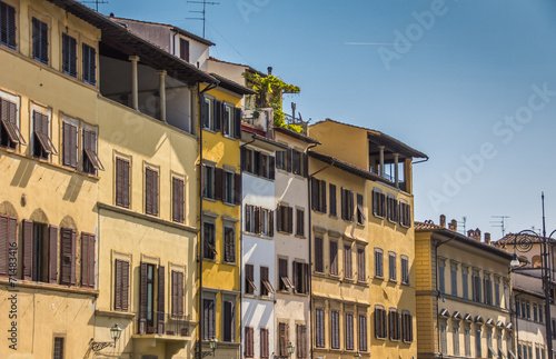 Old houses with blinds in the historic center of Florence