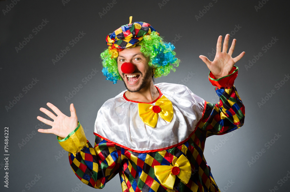 Funny clown in colourful costume Funny clown in colourful costume
