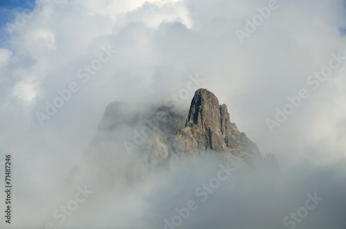 Mountain peak among the clouds