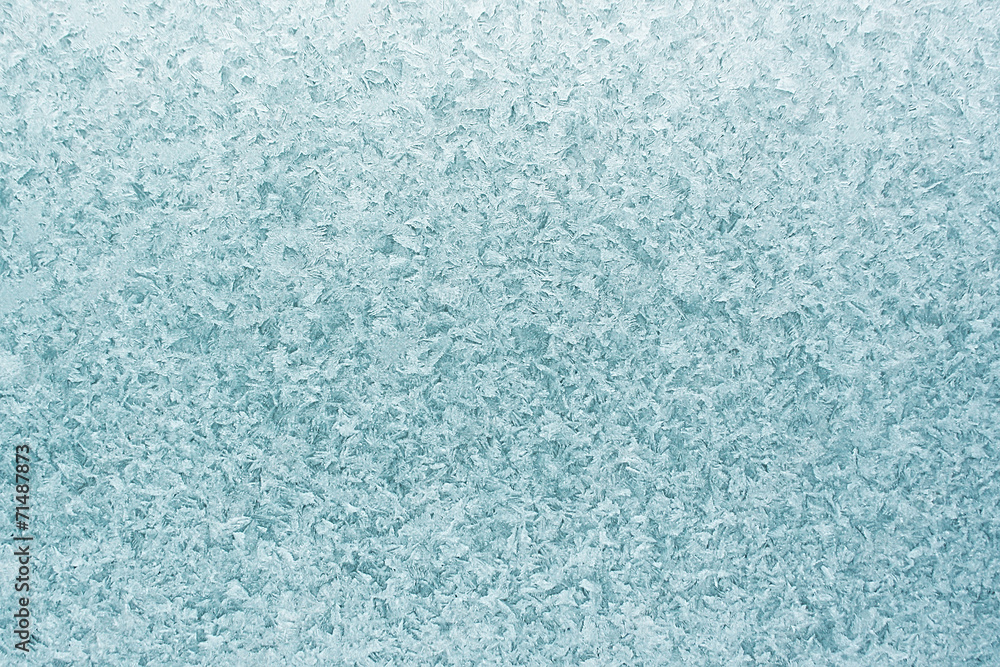 Patterns on glass in the frosty winter day. Christmas background Patterns on glass in the frosty winter day. Christmas background