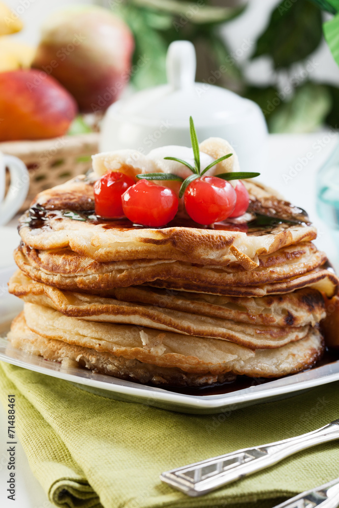 Pancakes with chocolate sauce fruit and coffee Pancakes with chocolate sauce fruit and coffee