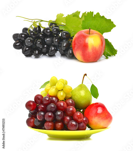 Ripe grape, the apple and pear on the plate