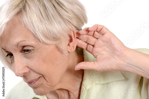 Obraz na płótnie femme senior écoutant une conversation