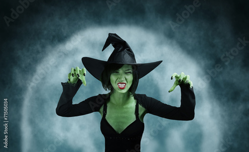 Spooky green witch