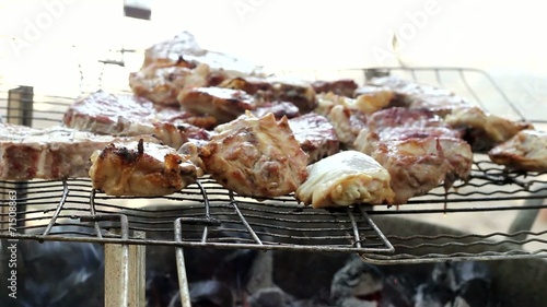 Meat is Turned on the Open Fire