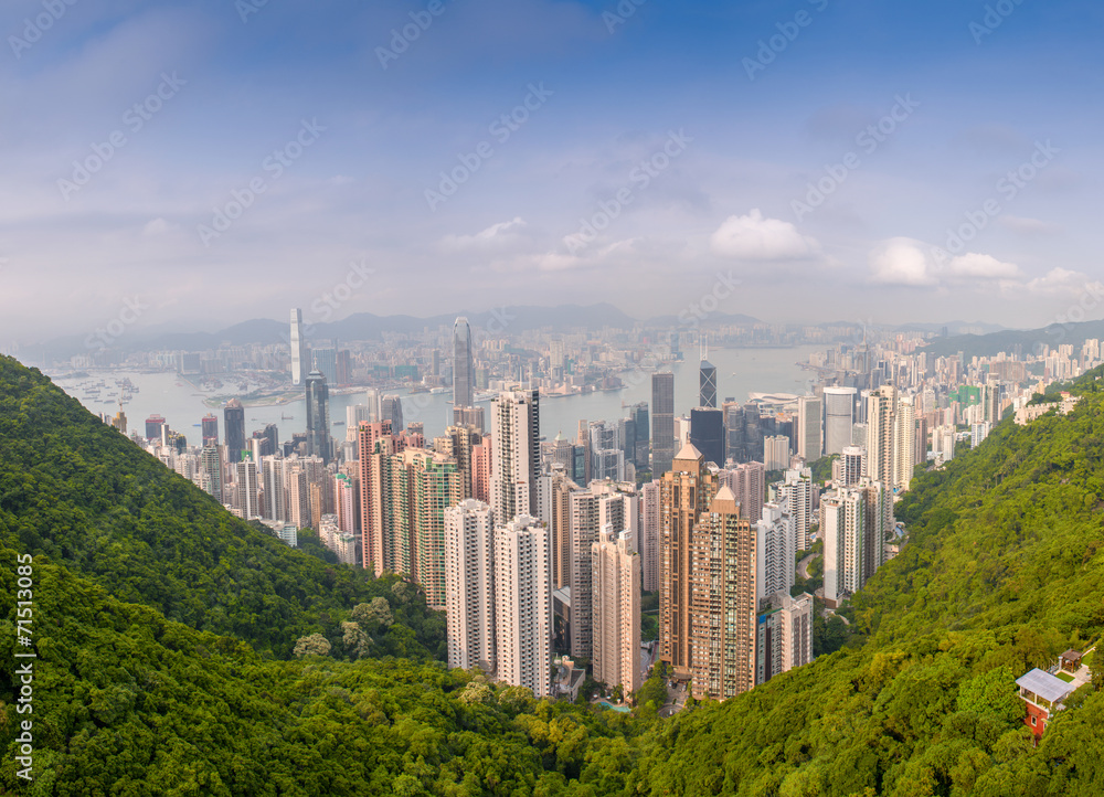 Fototapeta premium Panoramic view of Hong Kong cityscape on a beautiful sunny day