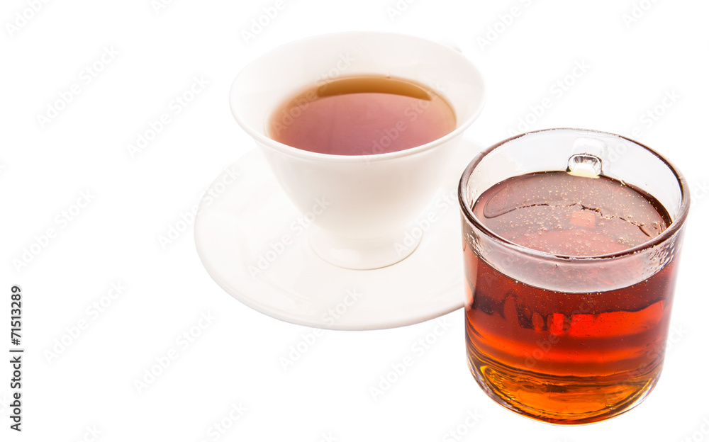A cup of tea and a jar of honey over white background A cup of tea and a jar of honey over white background