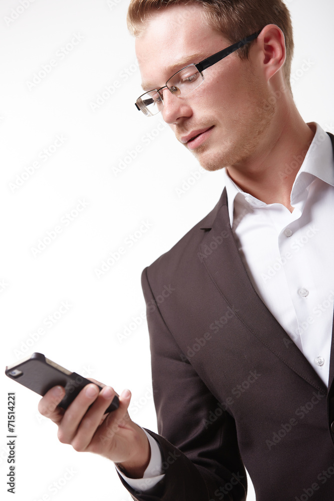 businessman in glasses with a telephone businessman in glasses with a telephone