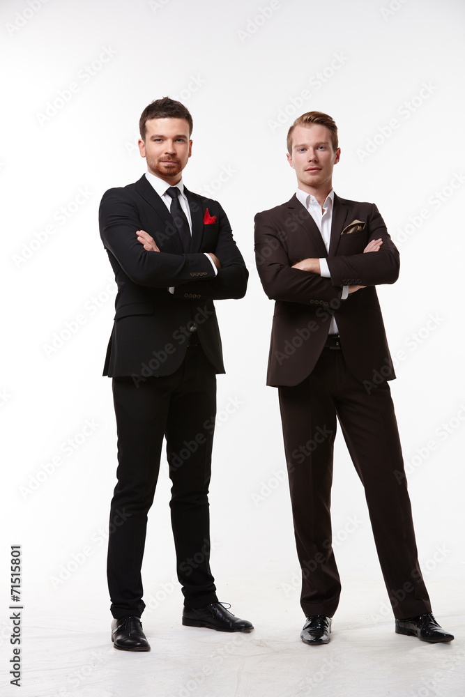 two businessman standing two businessman standing