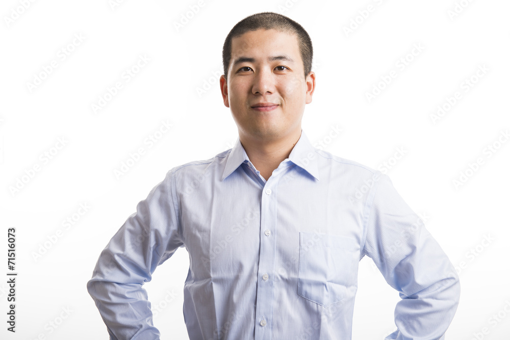 Young business man standing isolated on white Young business man standing isolated on white