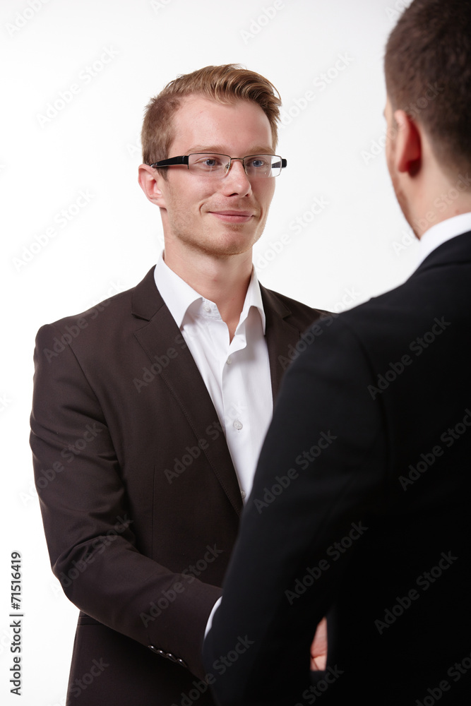 two businessman standing two businessman standing