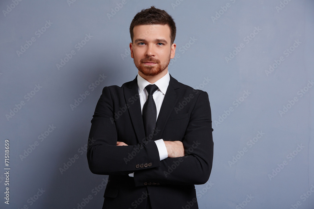 businessman in a suit smiling businessman in a suit smiling
