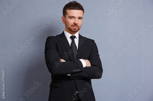 businessman in a suit smiling