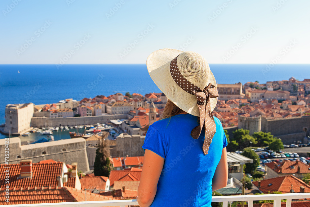 young woman looking at Dubrovnik, Croatia