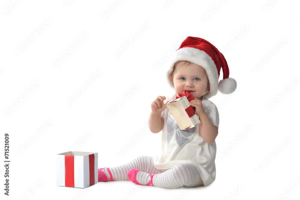 baby girl in Santa hat