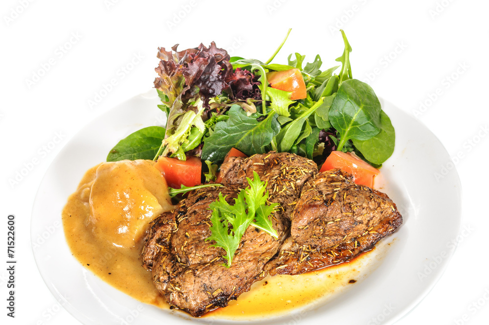 Rump steak with mashed potatoes and mix vegetable on plate Rump steak with mashed potatoes and mix vegetable on plate