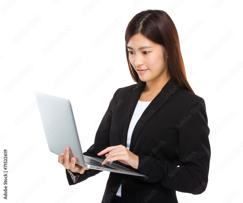 Businesswoman use notebook computer Businesswoman use notebook computer