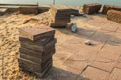 Stacks of interlocking stones for installing driveway