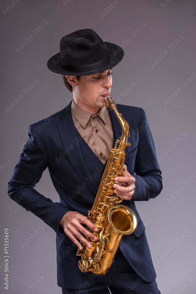Naklejka premium Handsome young jazz man