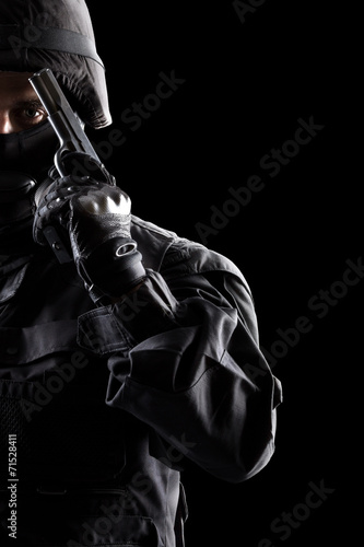 Spec ops soldier on black background © zorandim75