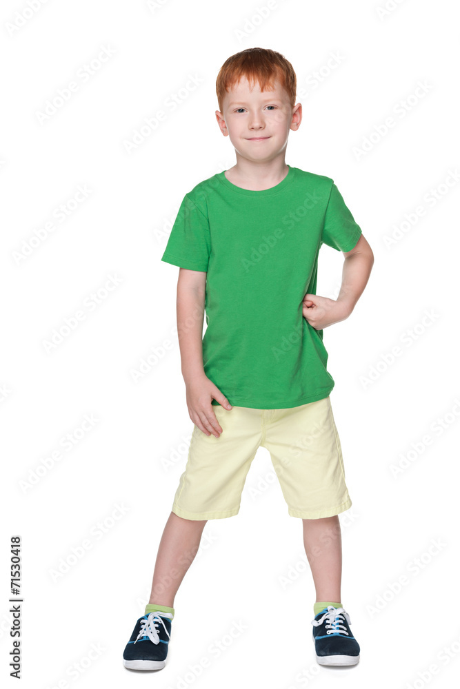 Young smiling boy in a green shirt Young smiling boy in a green shirt
