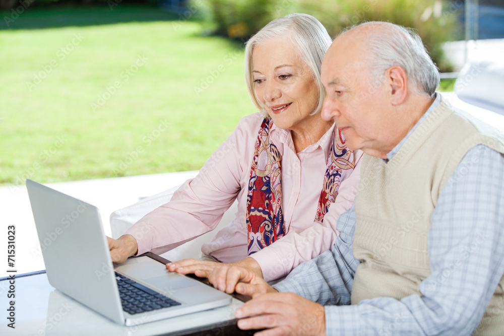 Senior Couple Using Laptop Senior Couple Using Laptop
