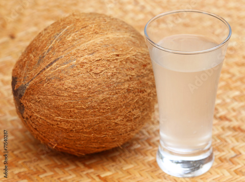 Fresh Coconut with water in a glass