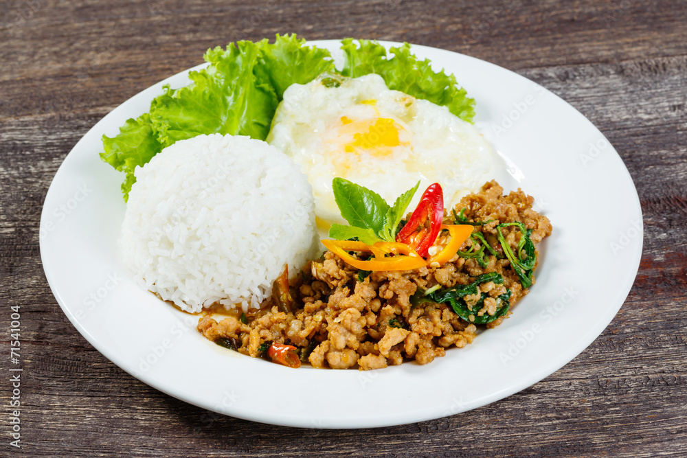 Rice topped with stir fried minced pork and basil Rice topped with stir fried minced pork and basil
