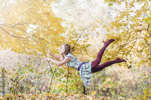 Levitation portrait of young woman