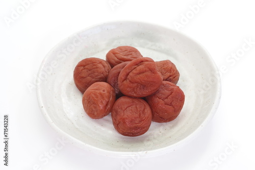 Japanese salt plum or pickled plum on white background