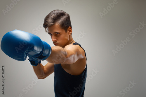 Boxing. Young Boxer ready to fight © puhhha