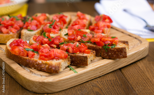 Bruschetta with sweet tomatoes and basil