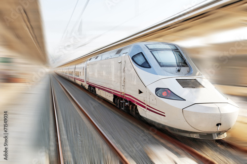 Modern Hi-Speed  Passenger Train. Motion effect. photo
