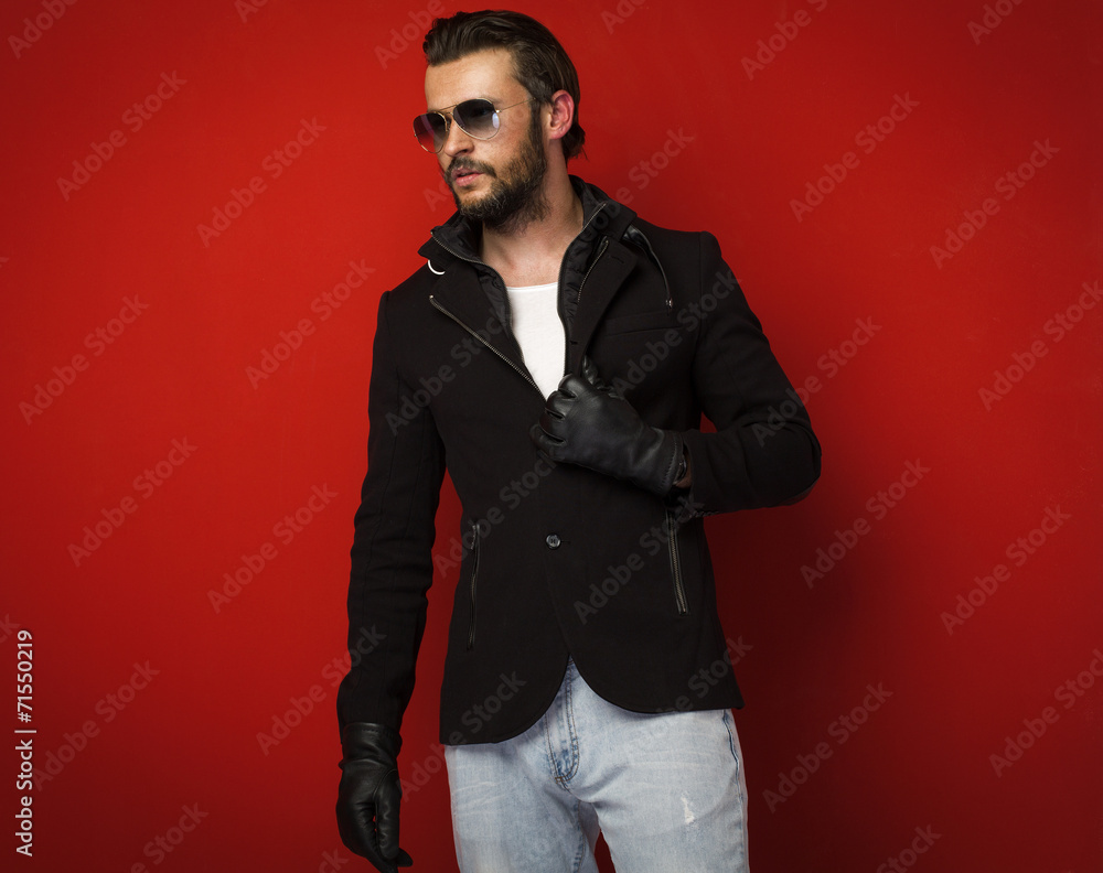Fototapeta premium Handsome man on red background
